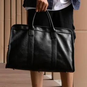 Faux leather holdall black 4919